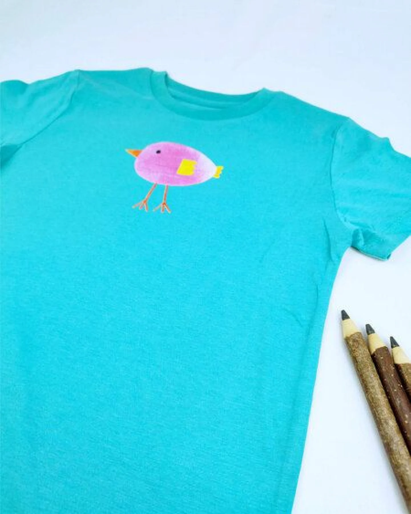 Meladi Kinder Shirt aus Biobaumwolle - Lila Vogel auf Türkis – Ansicht 2