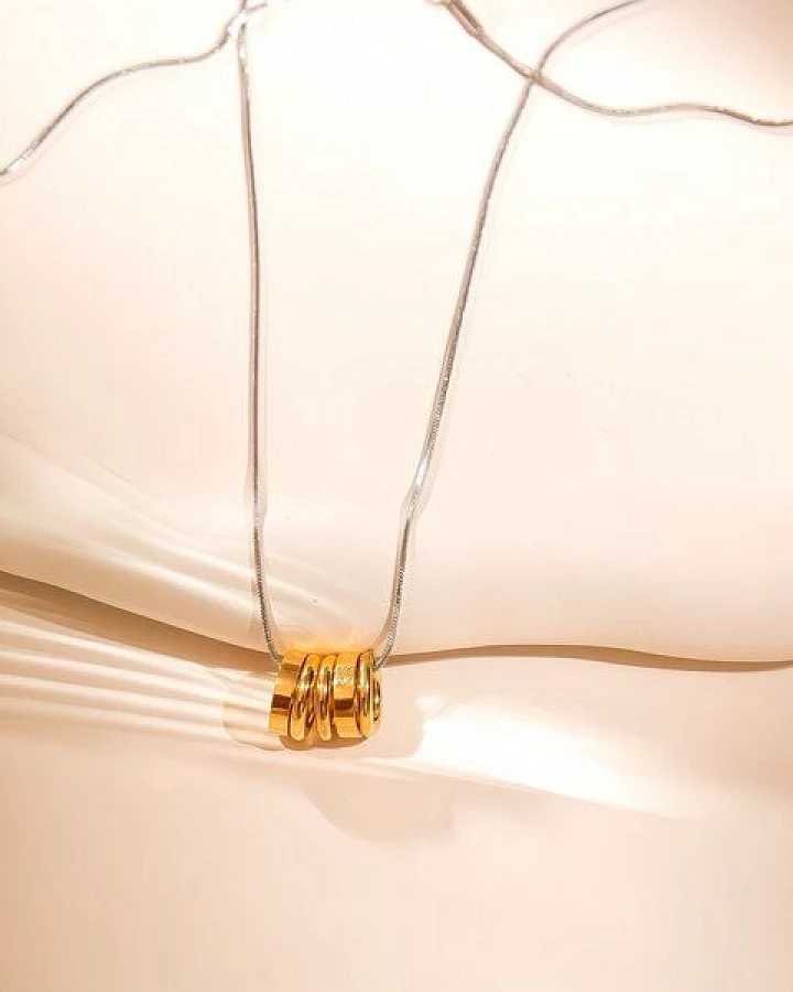 Silber Kette mit Gold Ringen