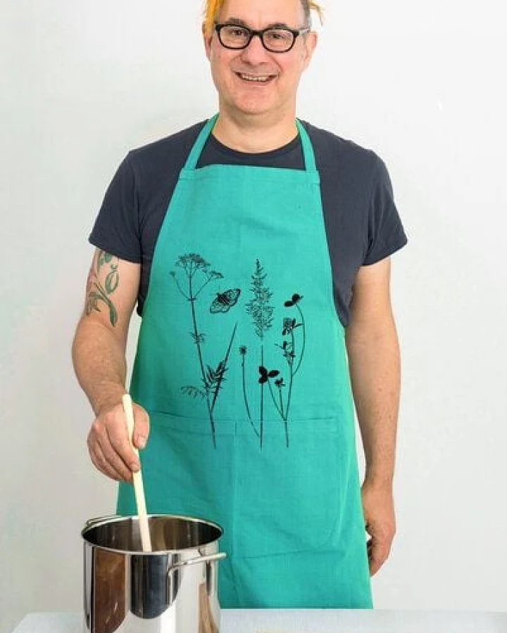 Hirschkind Bio-Kochschürze handgewebt Fair-Trade "Schmetterlingswiese" türkis