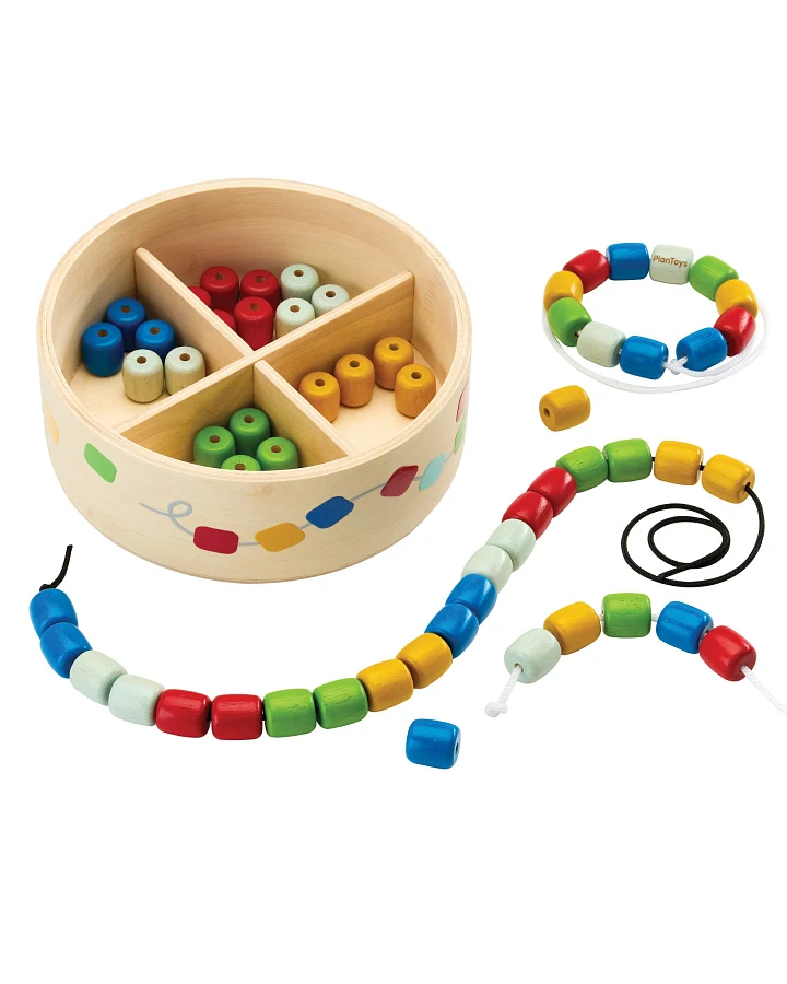 PlanToys - Fädelspiel mit Perlen in Holzbox