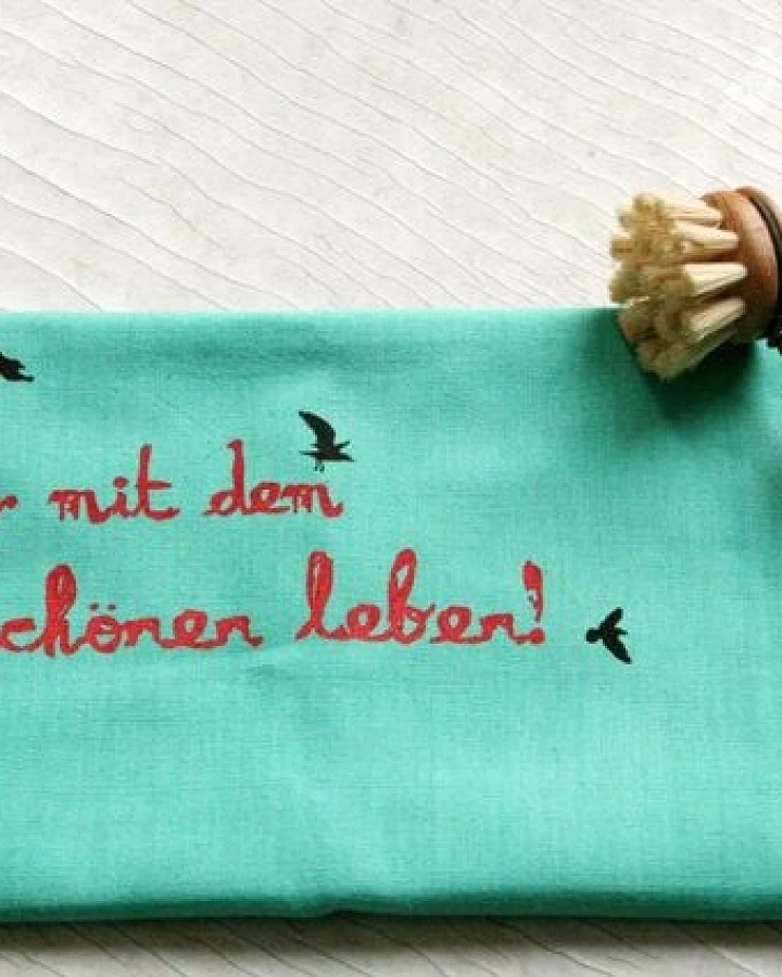 Hirschkind Handgewebtes Fair-Trade-Bio-Geschirrtuch "her mit dem schönen leben!" türkis