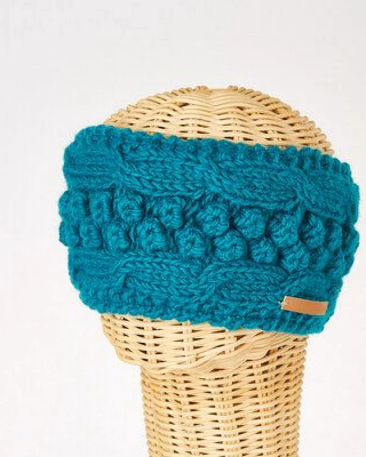short'n'pietz Schurwollstirnband mit Zopf- und Kugelmuster, handgestrickt