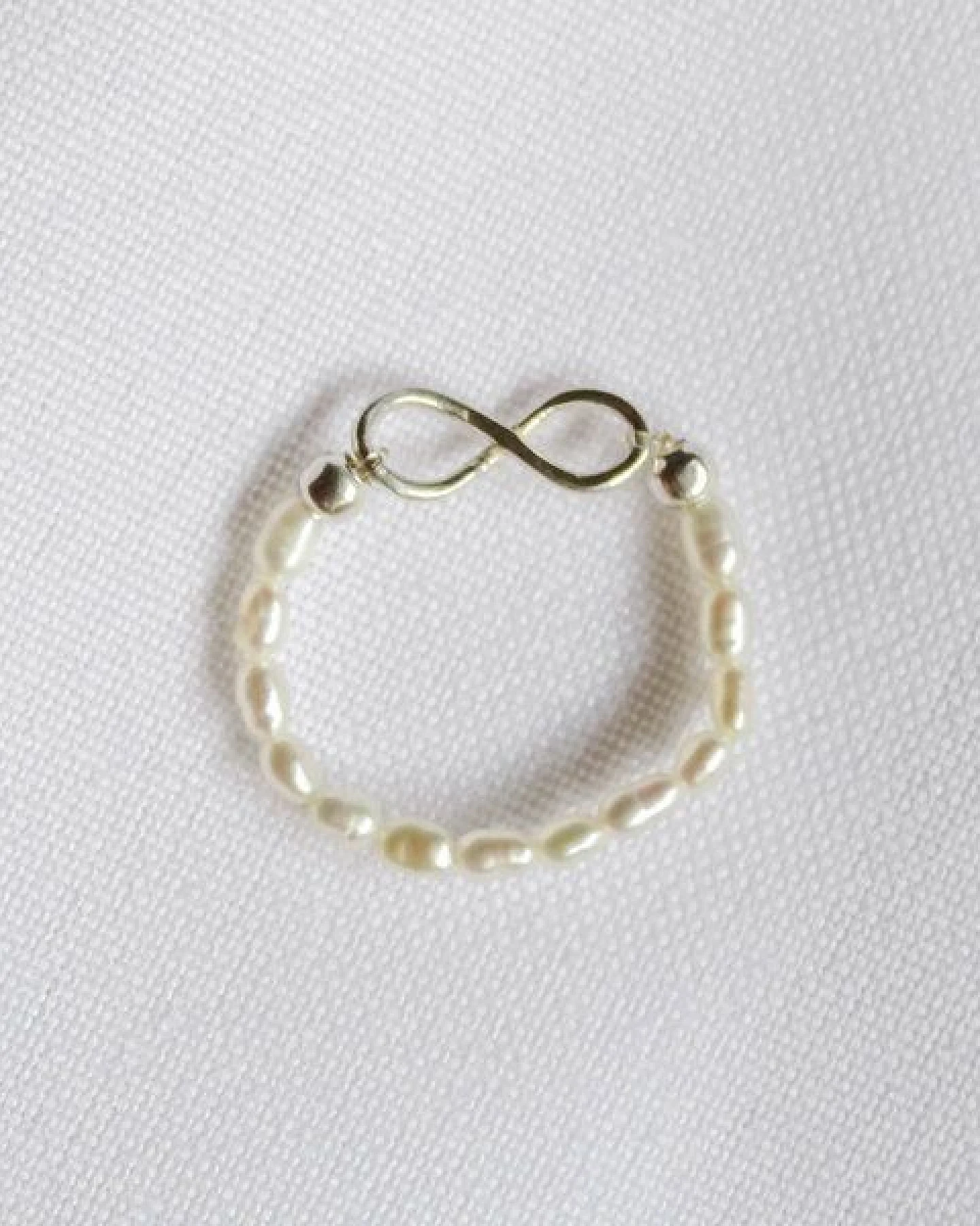 pakilia Perlen Ring mit Unendlichkeitssymbol Fair-Trade und handmade – Ansicht 2