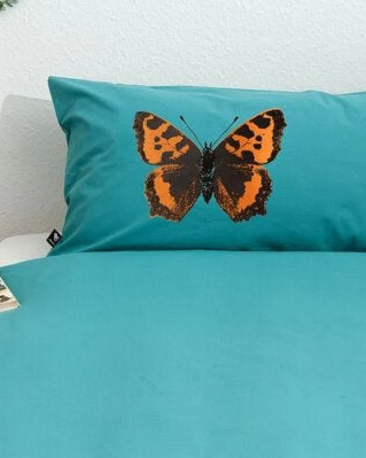 Hirschkind Bio-Kissenbezug 'Schmetterling' türkis 80x40cm